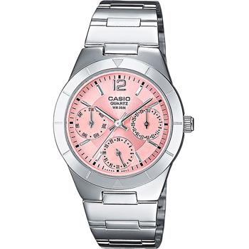 Casio dameur med pink urskive, tre subskiver og metalrem. Vandtæt til 50 meter.